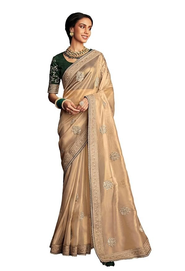 61oQVyQmHKL._SY879_ Shimmer Net Gold-coloured saree featuring an all-over heavy gold zari butta and sequence work on body decorated with border with contrast navy blue piping - Image 1
